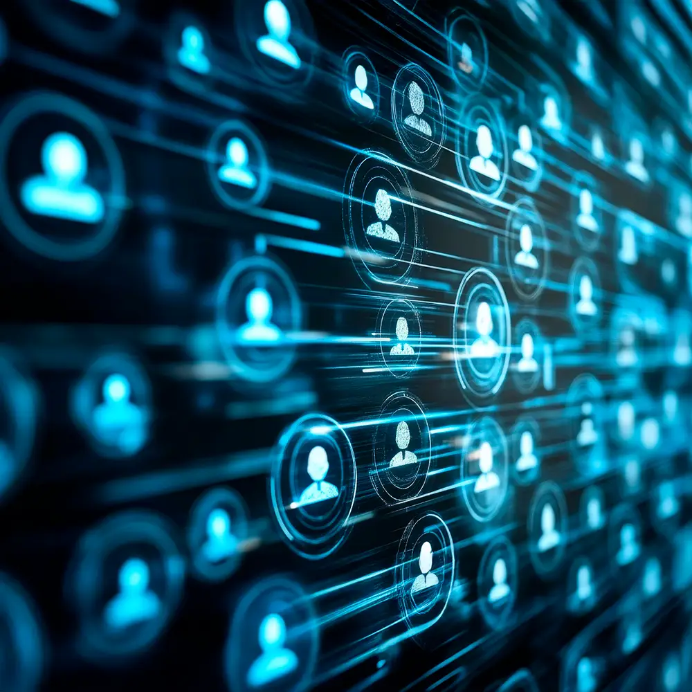 Digital network of glowing user icons connected by data lines representing customer behaviour and churn patterns