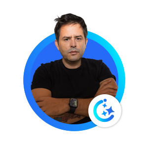 Portrait of a man in a black T-shirt with folded arms inside a blue circular frame.